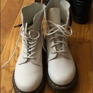 Doc Martens lace up boots. White